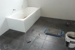Bathroom Renovation with Bath and Tiles